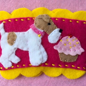 Ginger Wire fox terrier with cupcake coffee cup cozy