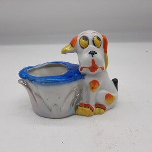 Vintage porcelain cartoon dog sitting planter yellow orange spots Japan kitsch