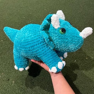 Handmade crochet large blue triceratops plushie.