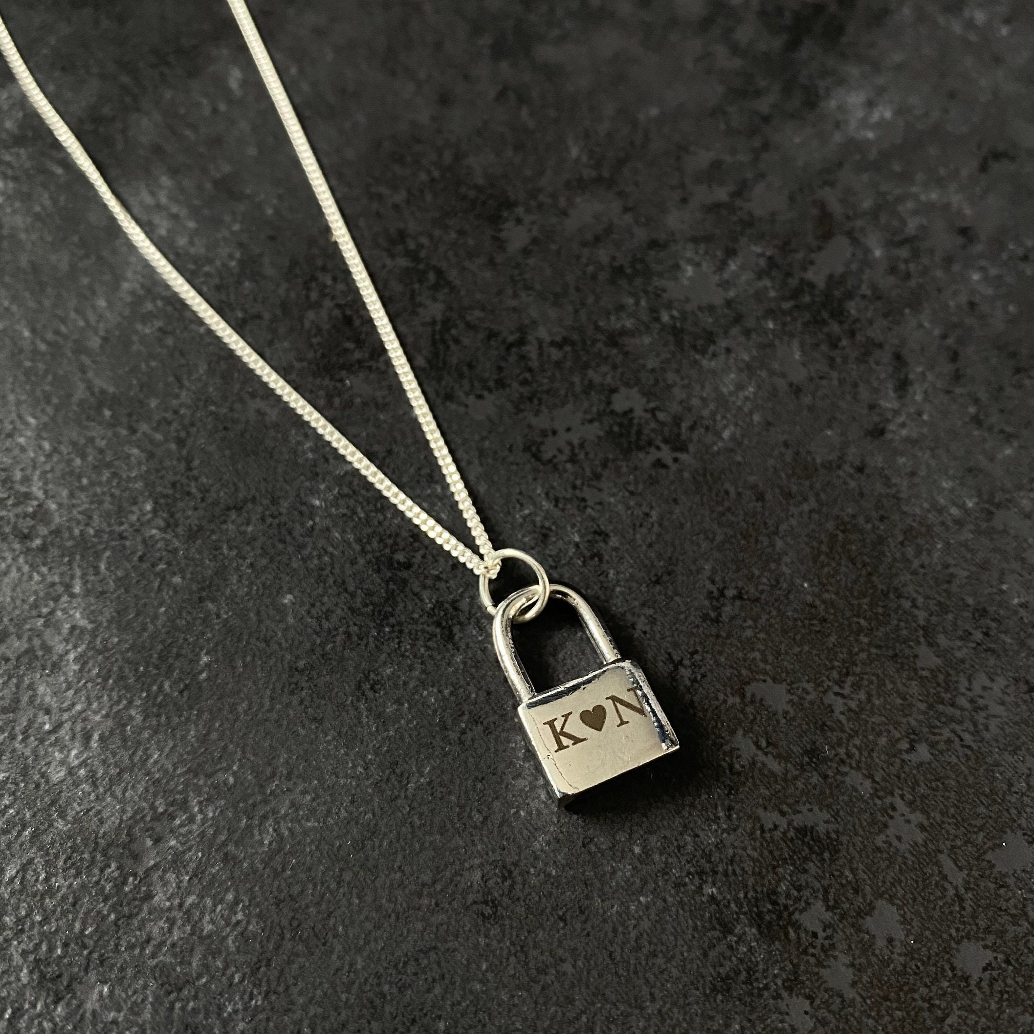 vuitton silver lock necklace