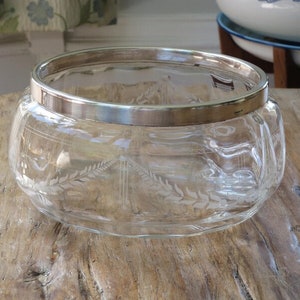 Lovely engraved crystal bowl with a silver plated rim