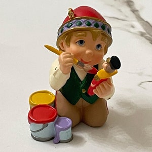 Vintage 1999 1990s Hallmark Keepsake Ornament Collector's Club Membership Ornament Artic Artist Elf Paining a Nutcracker Approx. 2" No Box