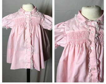 Vintage 1950s or 60s Cherubs Baby Girl's Pale Pink Button Front Dress Smocked Bodice Peter Pan Collar Lace Embroidery Trim Size 12 Months