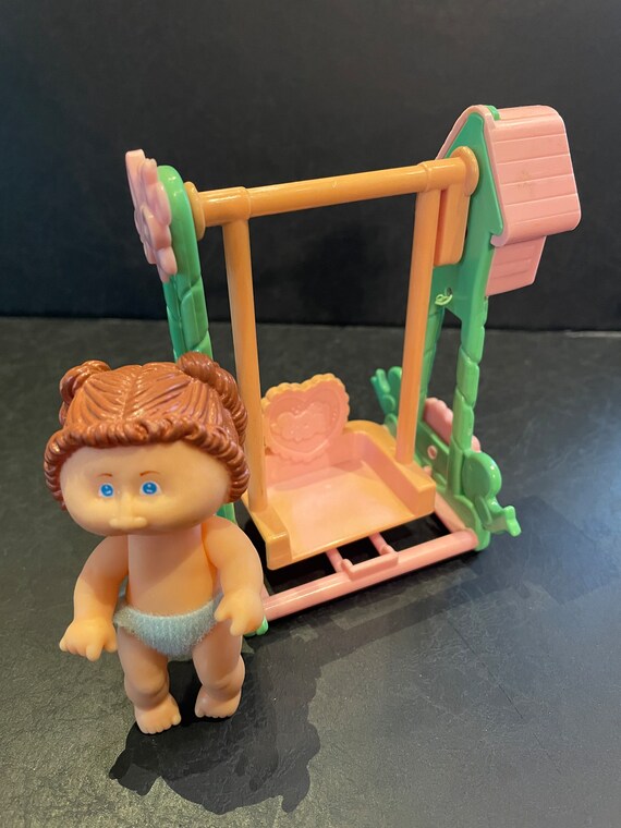 Old wind up baby swing 2025