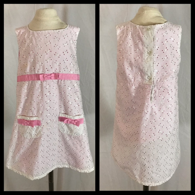 Sizs 4T Baby Togs Toddler Girl\u2019s A Line Dress White Eyelet Lined in Pink with Grosgrain Ribbon Trim and Patch Pockets