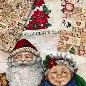 May include: A white fabric panel with a red poinsettia design and the text "SANTA CLAUS DOOR" printed on it. There are two figures of Santa Claus and Mrs. Claus on the fabric. The fabric is surrounded by other fabric panels with various Christmas designs.