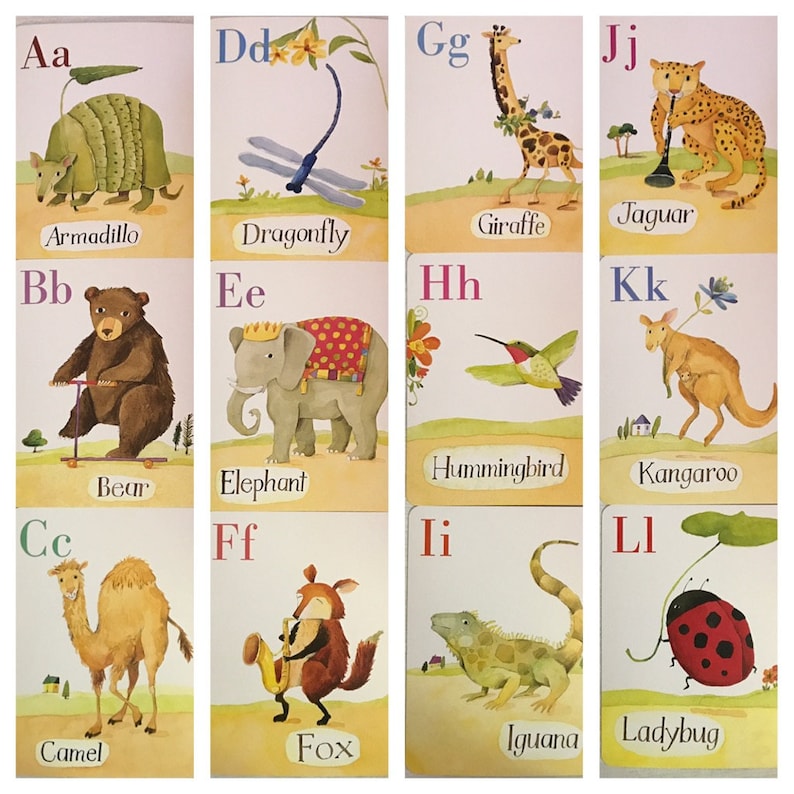 May include: A colorful alphabet flashcard set featuring illustrations of animals and objects. Each card has a letter, a picture, and the name of the animal or object. The letters are in a pink font, and the names are in a black font. The illustrations are bright and colorful, and the cards are perfect for teaching young children the alphabet.