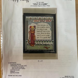May include: Cross stitch kit with a white background and a black frame. The image inside the frame is a colorful illustration of a golfer with a bag of clubs and the text "GOLF GOLF GOLF GOLF" and "How can you not like a game where it's okay to get teed off, tote a six-iron, shoot birdies, and if you're under par it's a great day?" The kit is 8 inches by 10 inches.