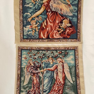 May include: Two vintage tapestry panels featuring angels. The top panel shows an angel with wings holding a child, surrounded by other angels. The bottom panel shows three angels dancing around a tree with red apples.