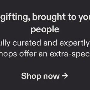 May include: A dark gray graphic with white text that reads: Holiday gifting, brought to you by real people. Thoughtfully curated and expertly designed&mdash;small shops offer an extra-special touch. Shop now with a right-pointing arrow symbol.