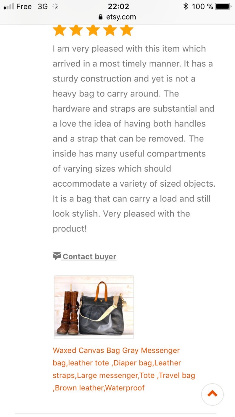 May include: A gray waxed canvas messenger bag with brown leather straps and handles. The bag is shown on a wooden surface with a pair of brown leather boots. The text "Waxed Canvas Bag Gray Messenger bag, leather tote, Diaper bag, Leather straps, Large messenger, Tote, Travel bag ,Brown leather, Waterproof" is below the image.