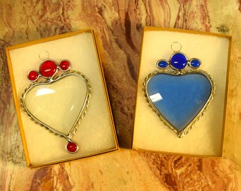 Beveled Hearts suncatcher in blue, red or purple. Gift box and hanger included.