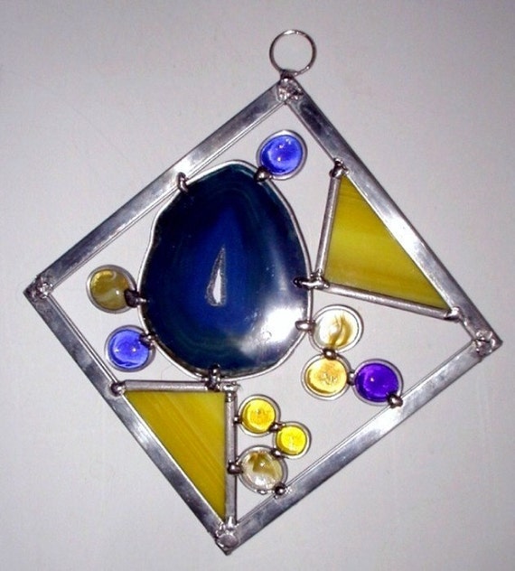 Medium stained glass square sun catcher with brazilian agate and filled with stained glass.