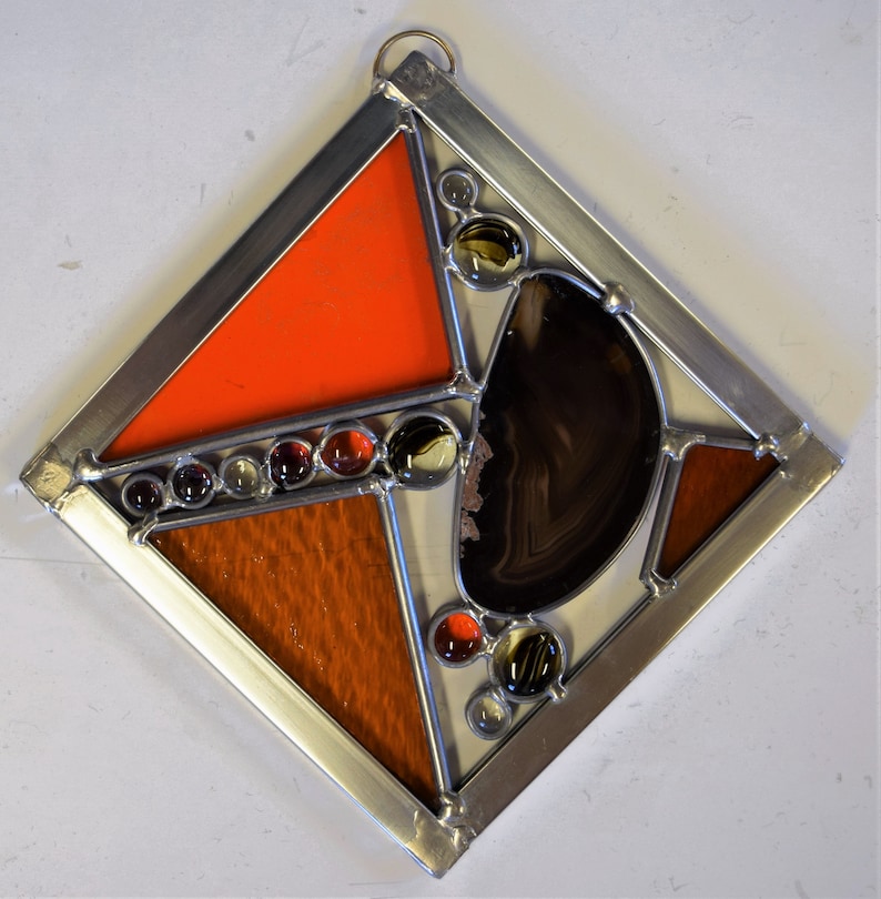 Medium stained glass square sun catcher with brazilian agate and filled with stained glass.