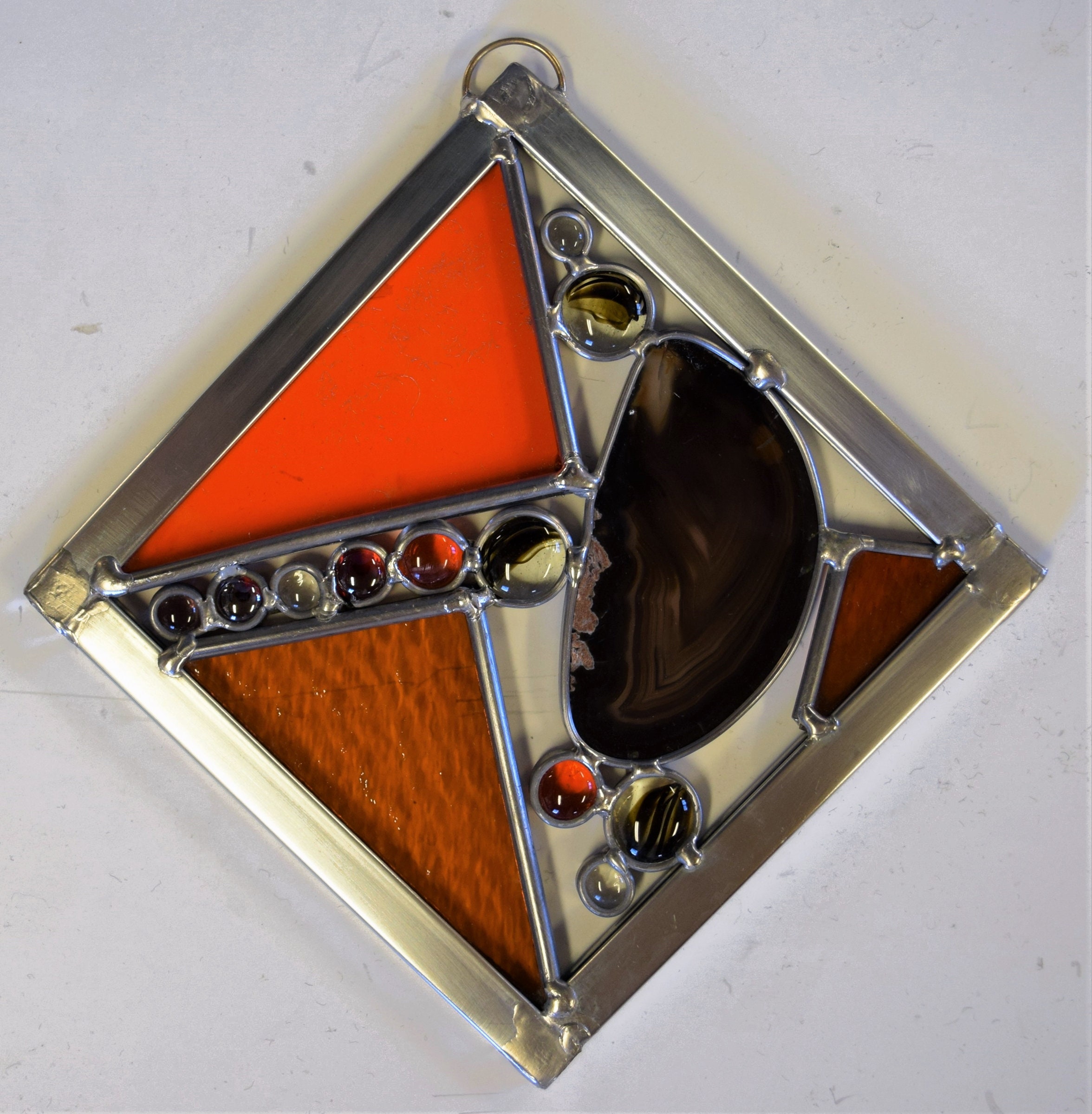 Medium stained glass square sun catcher with brazilian agate and filled with stained glass.