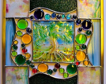 A stained glass panel with a fused glass Tree of Life in the middle. No. 2