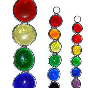 Fun stained glass Rainbow suncatchers.  Ready to hang with suction cup included.