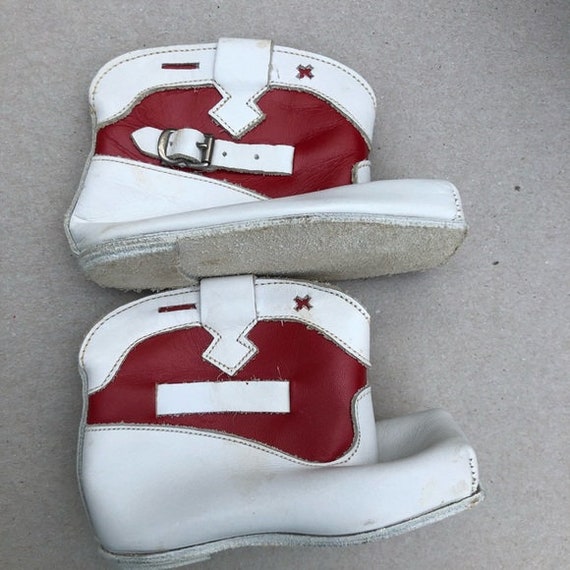 Infant crib boots Gertrude’s 1950’s