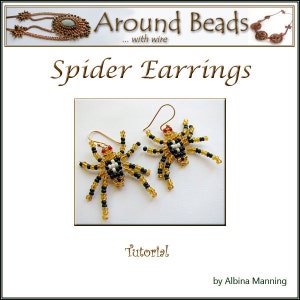 May include: A pair of beaded spider earrings with gold wire hangers. The spiders are made with black, white, and gold beads. The earrings are a tutorial by Albina Manning.