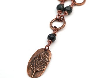 Leaf necklace with green and black kambaba jasper beads and copper tone chain, 20 1/2 inches long