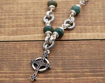 Green Celtic cross necklace with moss agate beads and silver tone chain, 20 1/4 inches long