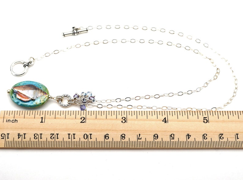 Nautilus shell necklace Austrian crystal and freshwater pearls 20 inches long sterling silver chain