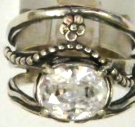 Ring Sterling silver set with cz zircon flower motif. Israeli designer bohemian ring