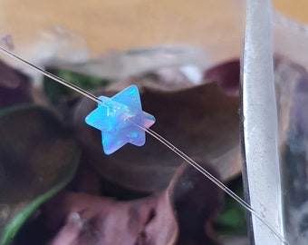 Blue opal Cubic Merkaba Star of David Necklace on a clear string Jewish Symbol