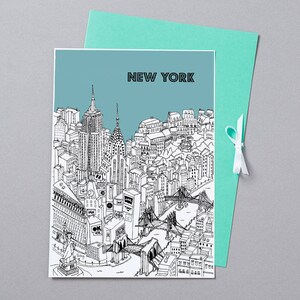 May include: A black and white illustration of the New York City skyline, including the Empire State Building, Chrysler Building, and Brooklyn Bridge, is featured on a card. The card is paired with a teal envelope tied with a white ribbon.