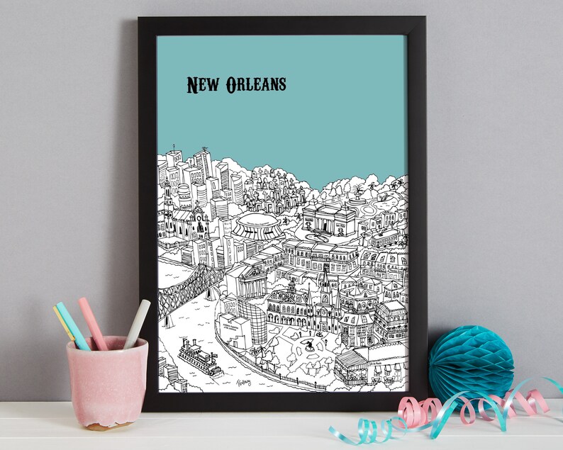 May include: Black and white line drawing of the New Orleans skyline with a light blue background. The drawing includes buildings, a river, a bridge, and a steamboat. The text "NEW ORLEANS" is at the top of the image.