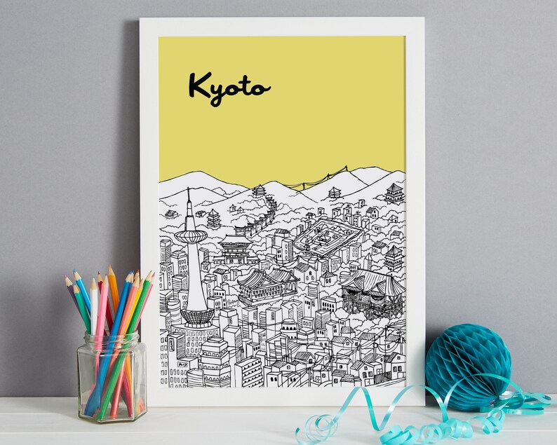 May include: A black and white line drawing of the Kyoto skyline on a yellow background. The drawing includes buildings, mountains, and a tower. The word "Kyoto" is written in black at the top of the image.