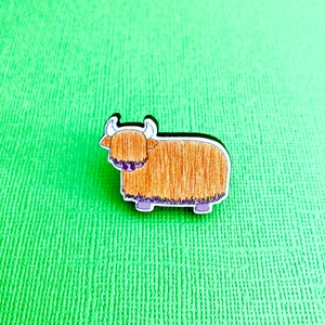 Orange highland cow wooden pin badge