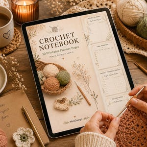 May include: A digital tablet displaying a crochet notebook with 30 printable planner pages, featuring sections for project planning, yarn inventory, and progress tracking, decorated with illustrations of yarn balls, flowers, and a crochet hook.