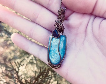 Blue kyanite wire wrapped pendant in antique copper wire and chain