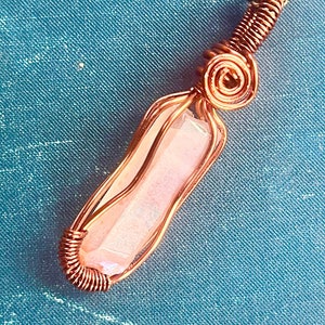 Copper wire wrapped aura quartz pendant on copper chain