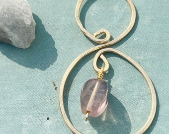 gold hammered spiral necklace with tiny purple fluorite stone