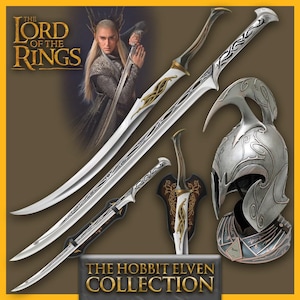 May include: The Hobbit Elven Collection features a silver helmet with intricate details, a long silver sword with a gold hilt, and a smaller silver dagger with a gold hilt. The swords and dagger have intricate designs and are displayed on a wooden stand.