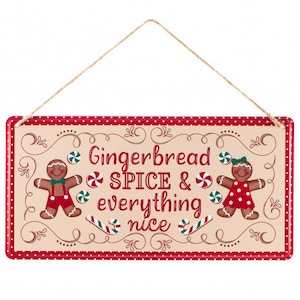 May include: A red and white metal sign with a gingerbread man and woman on either side. The sign reads "Gingerbread Spice & everything nice".