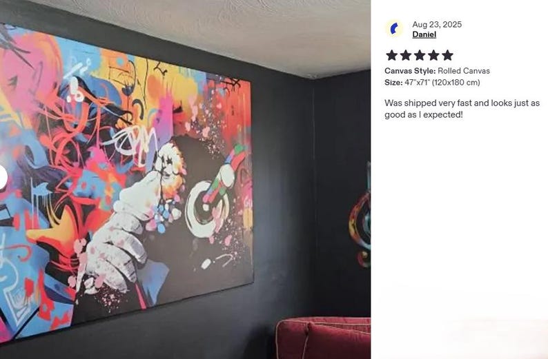 a large, colorful abstract painting hanging on a wall. The painting is vibrant and eye-catching, with a mix of bold colors and dynamic brushstrokes. The wall on which the painting is mounted is black, providing a striking contrast to the artwork. The painting appears to be a modern, contemporary piece that adds a lively and energetic atmosphere to the room.