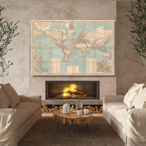 May include: A large rectangular wall map featuring a vintage world design with a light blue ocean background and tan landmasses. The map displays detailed geographical borders, shipping routes, and text titled Hémisphère Occidental.