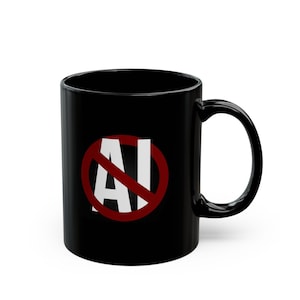 May include: Black ceramic mug featuring a white "AI" symbol with a red prohibition sign. The mug has a curved handle and a glossy finish. The design is centered on the mug's surface.