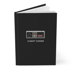 Cheat Codes Journal | Retro NES Controller I 8-Bit Gamer Hardcover Notebook