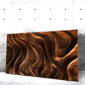 May include: Abstract wall art featuring a brown wood panel with a carved, wavy pattern. The wood has a rich, dark brown colour and the waves create a sense of depth and movement.