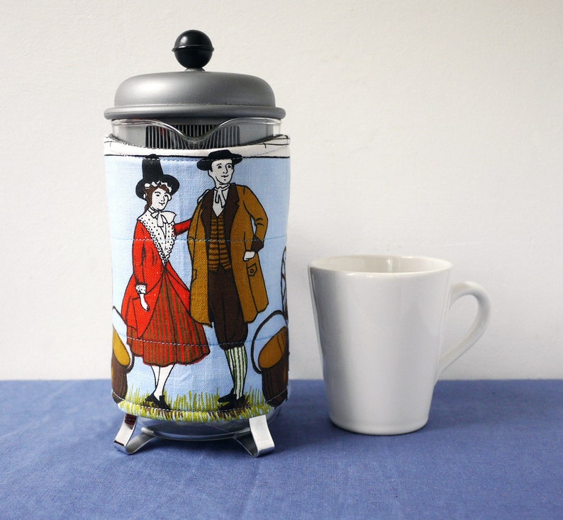 Pareja galesa cafetera acogedora tela reciclada arpa y rueda | Etsy México
