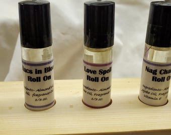 Roll on fragrance oils, 6 different scents available, Cucumber Melon, Dragons Blood, Love Spell, Lilac, Nag Champa, Sandalwood, One or all.