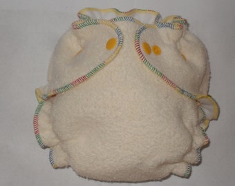 Hemp/Zorb fitted diaper with yellow snaps and primary color thread