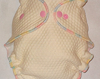 3D Zorb Fitted diaper with pastel colored thread and pink snaps