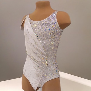 Leotards for rhythmic gymnastics. Gymnastics leotard for competition. Acrobatic gymnastics costume. Ice figure skating dress.