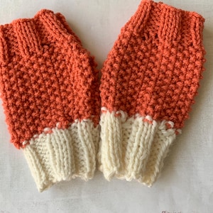 Orange and creamy white hand knit fingerless gloves
