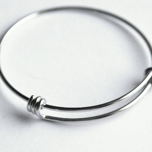 Baby Bangle Stainless steel TRIPLE LOOP expandable bangle bracelet. Lovely tarnish free,  no plating to wear off. charm bracelets (y40)
